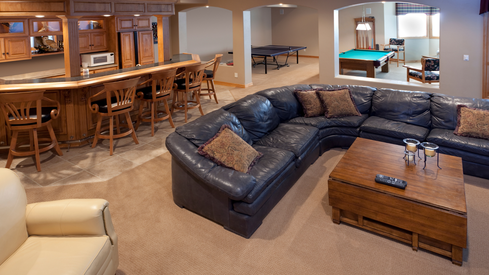 A comfortable basement entertainment area. 