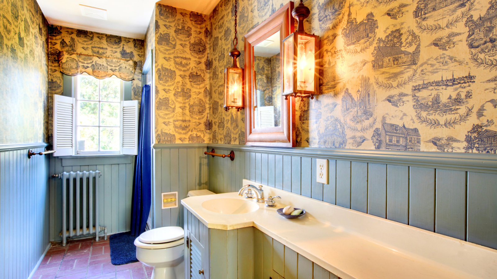 A unique bathroom with mixed metal finishes. 