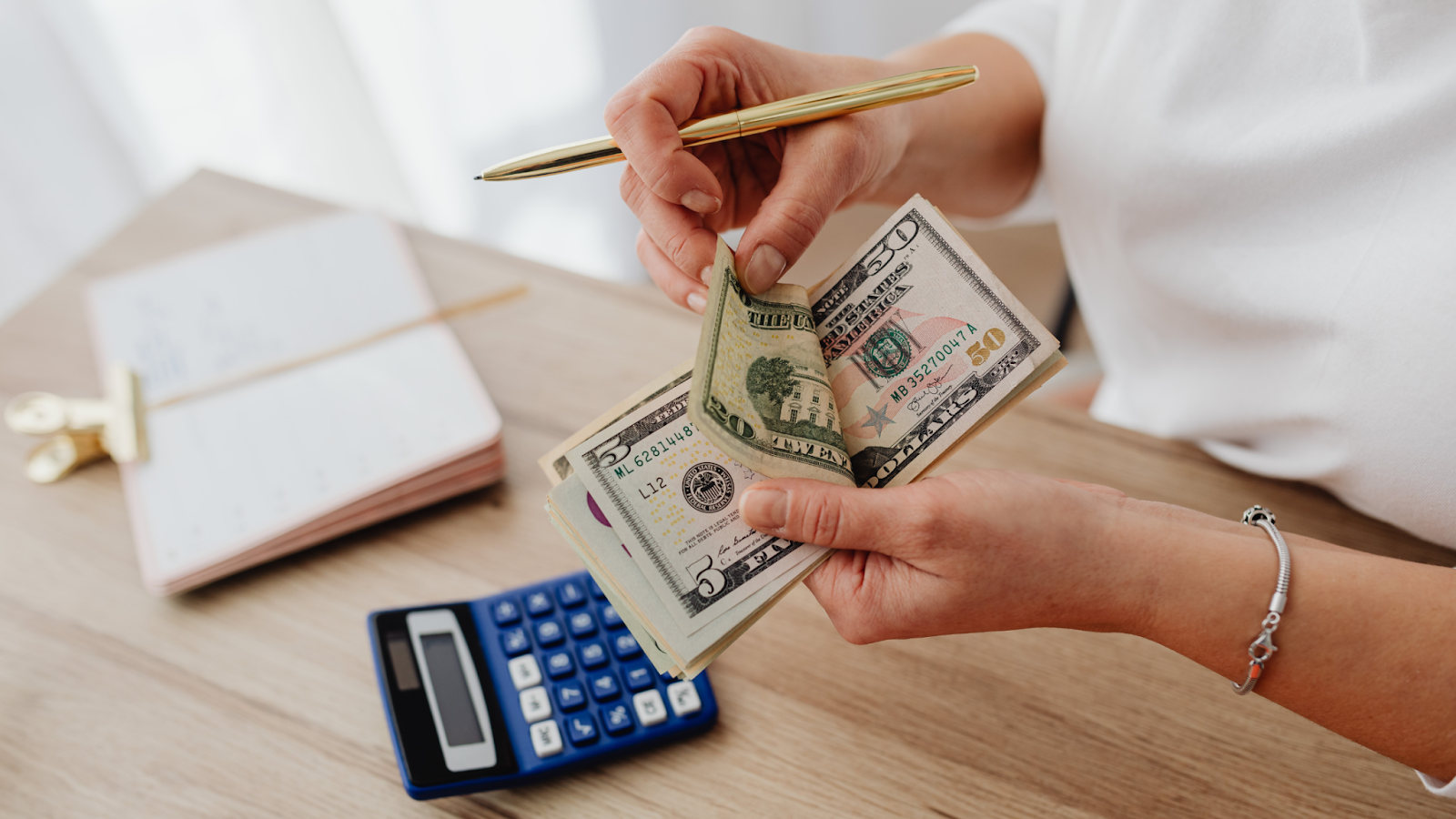 A person counting money.