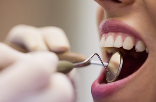 dentist looking in mouth
