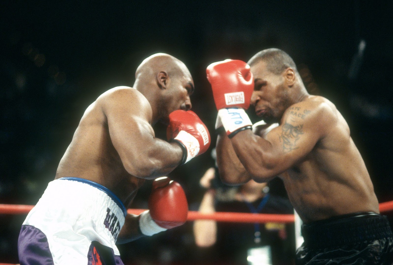 Evander Holyfield and Mike Tyson circa 1997. | Source: Getty Images