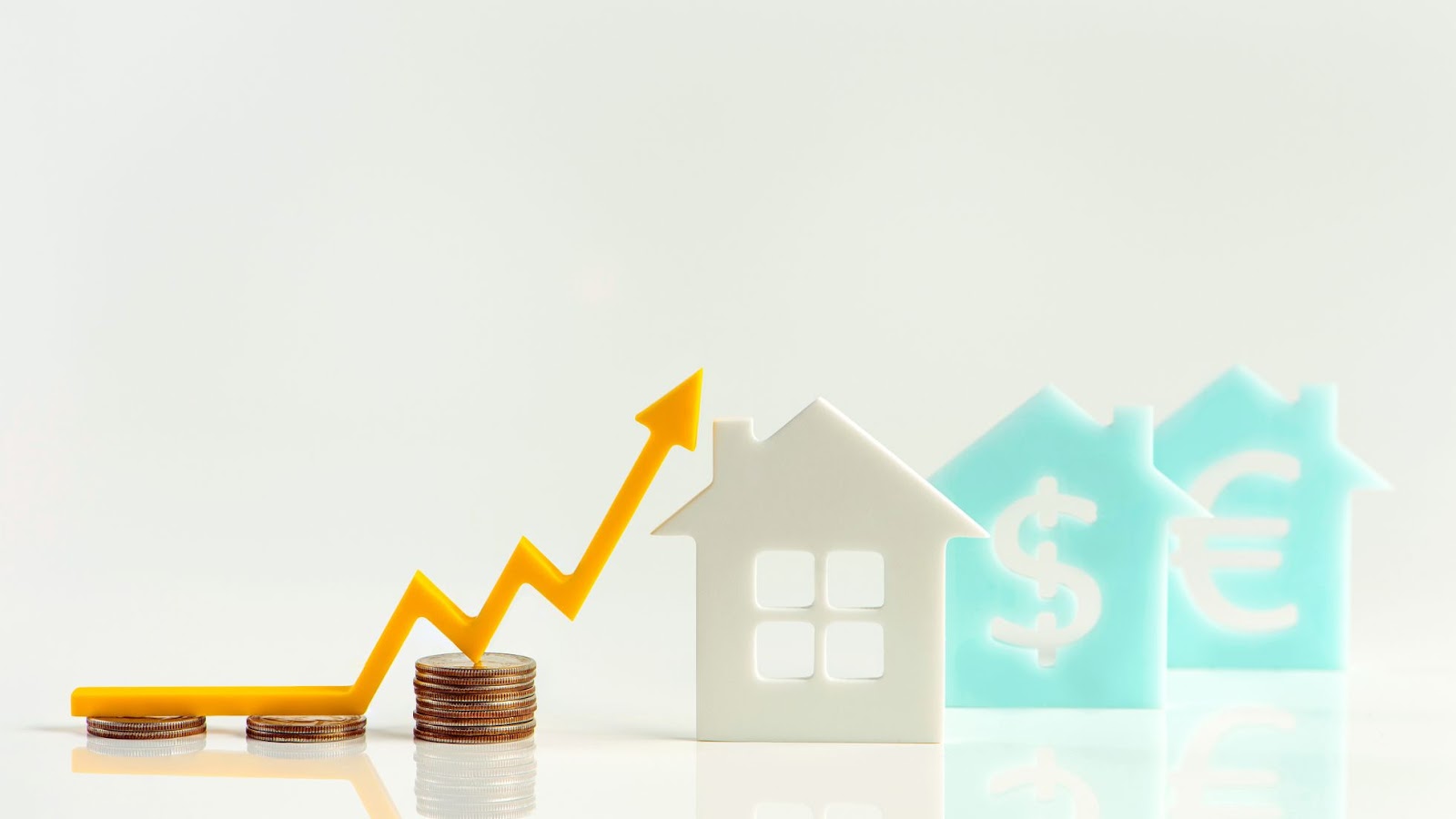 A chart with some houses and coins that represent an increase in home value.