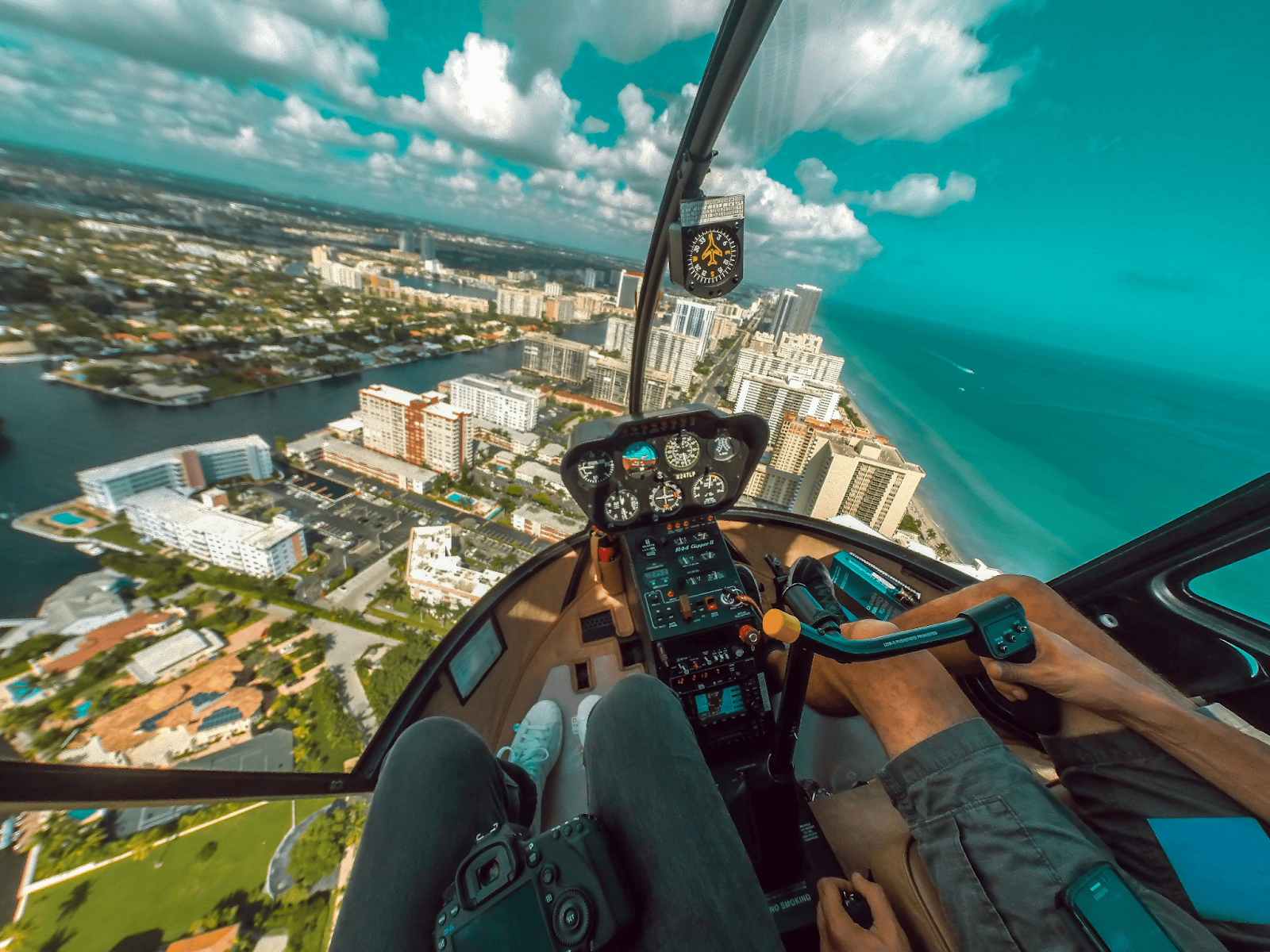 Two people in a helicopter bachelor party activities in Vegas