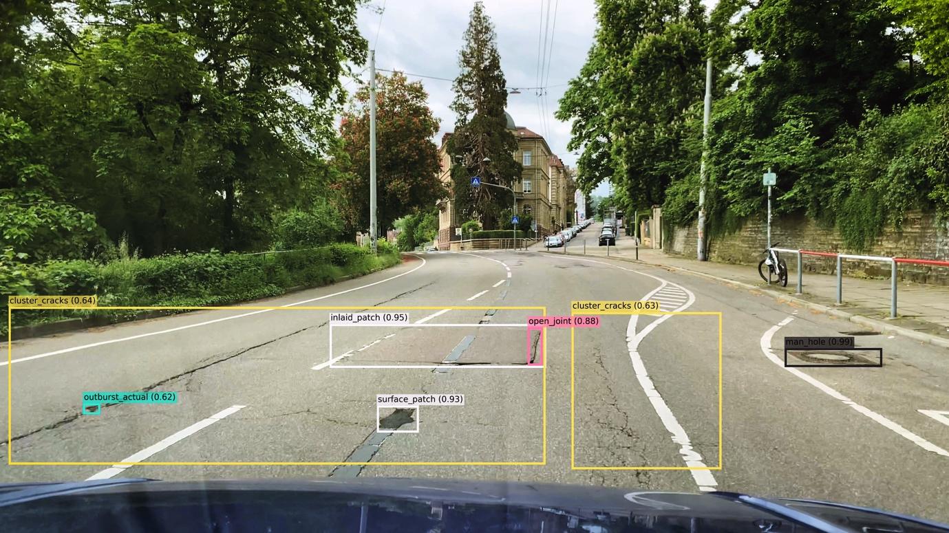 A road with trees and buildings

Description automatically generated