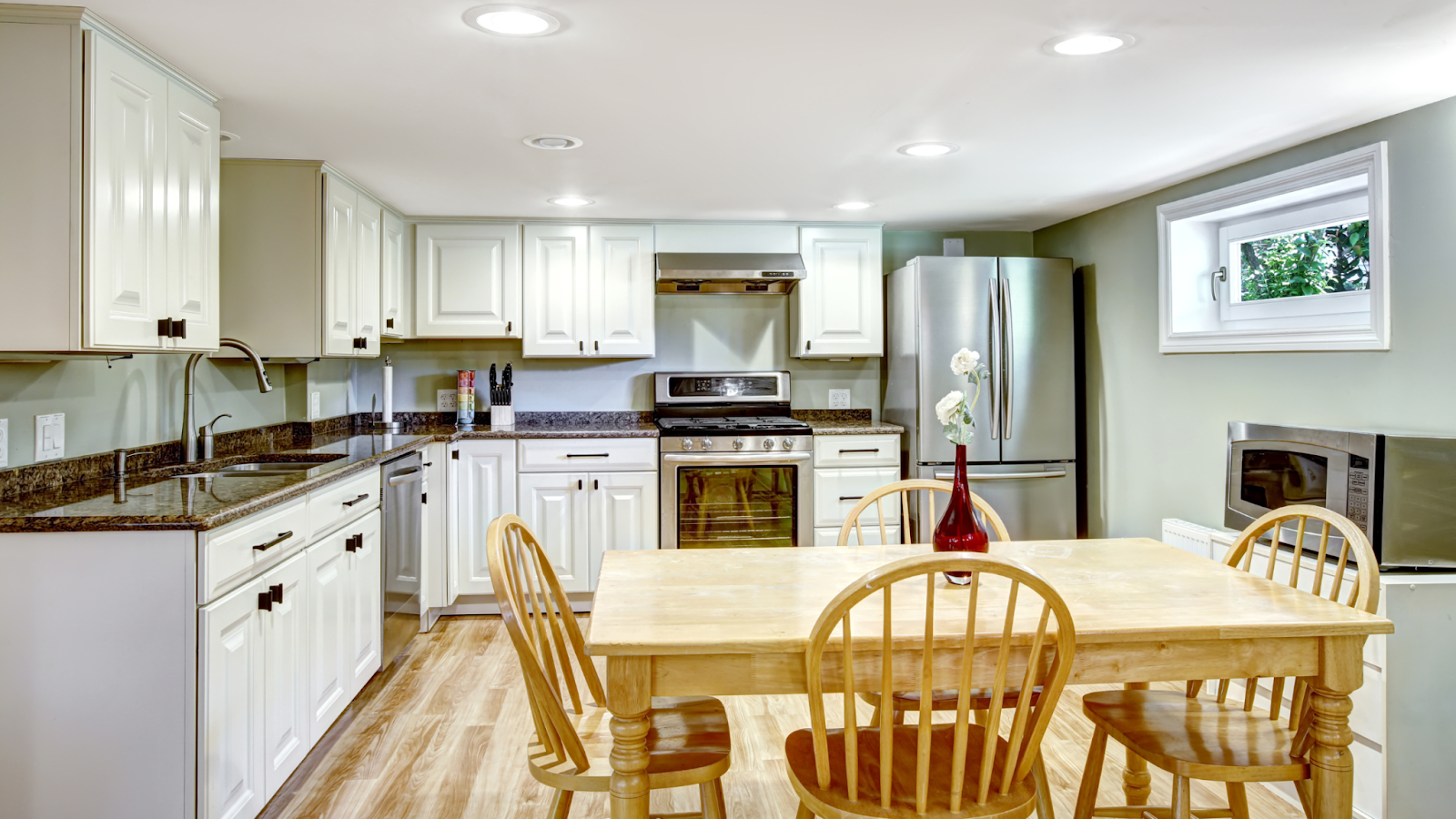 A basement that's been remodeled into a kitchen. 